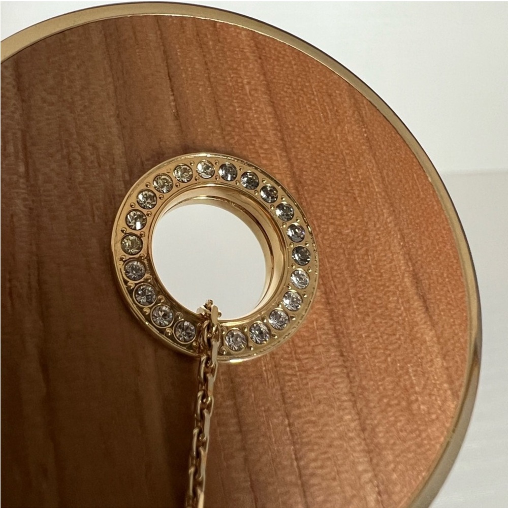 Swarovski Elegant Gold and Brown Circle Pendant Necklace